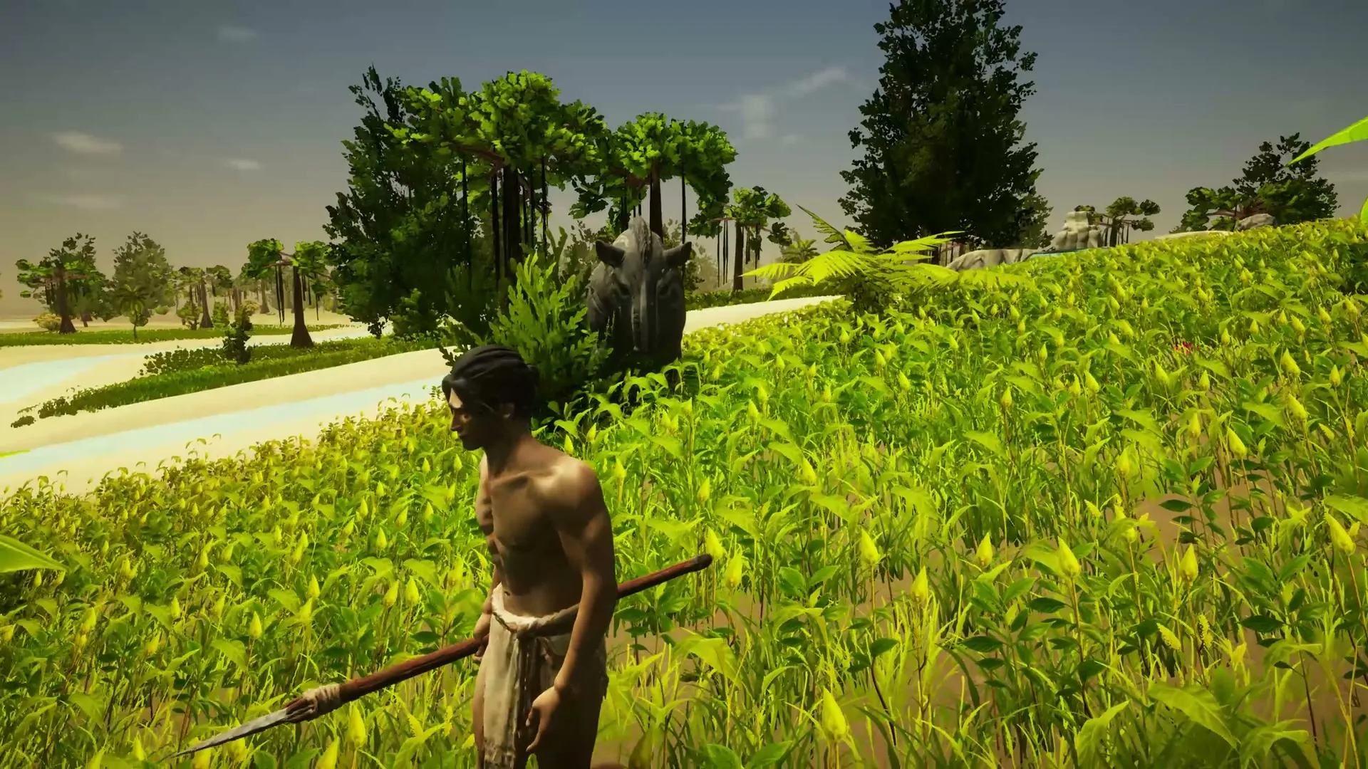 Spear in hand at the edge of the grassland